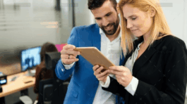 demo-attachment-545-businesspeople-discussing-while-using-digital-WFGVC3X@2x